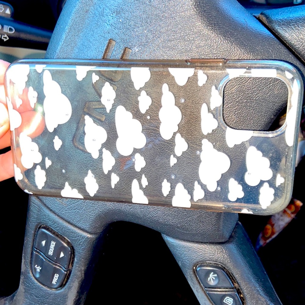 Clear phone case with cloud designs